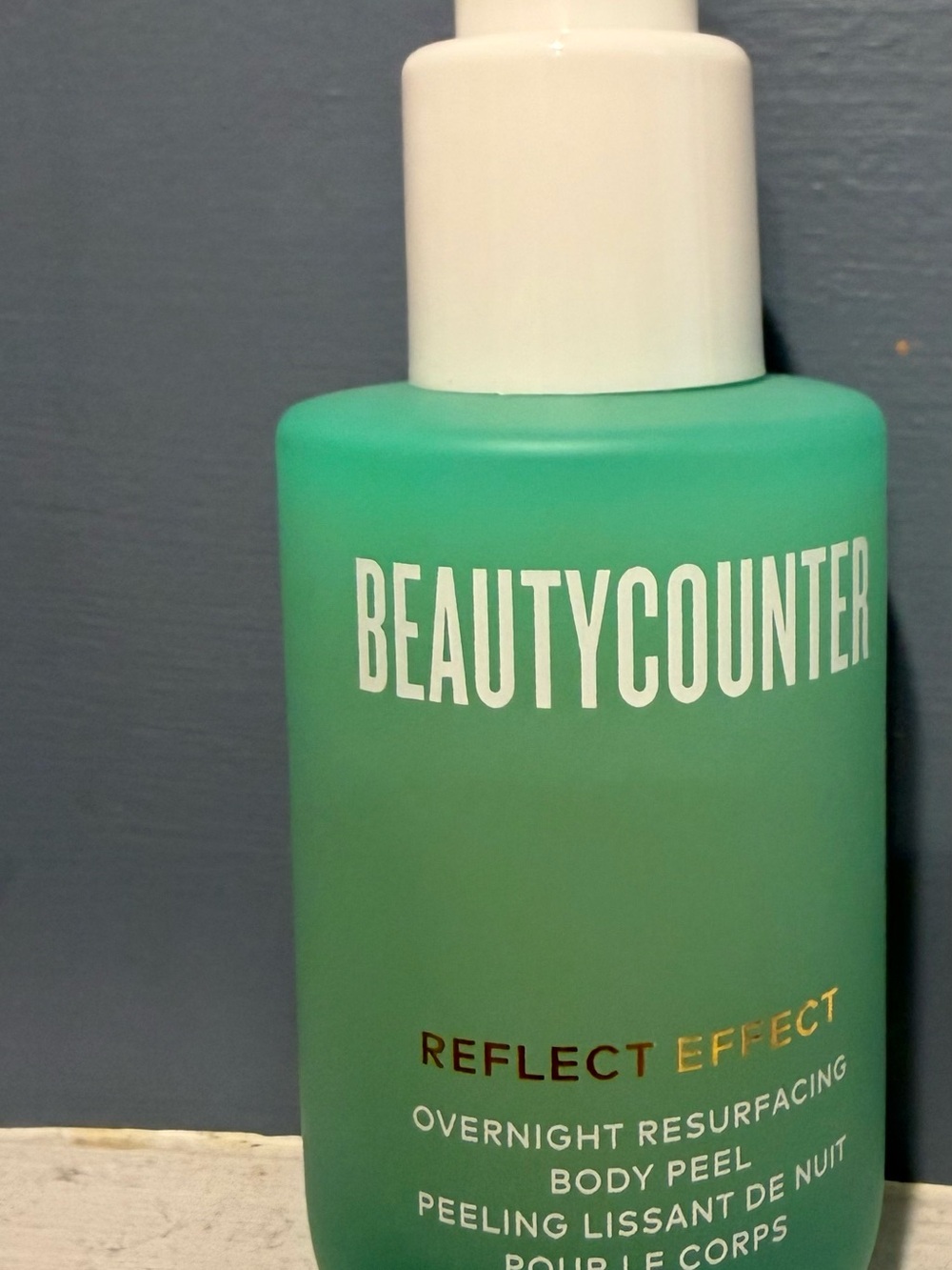 Beautycounter Reflect Effect Overnight Resurfacing Body Peel - teal green bottle